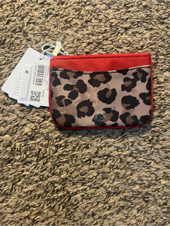 lululemon athletica Handbags - Lululemon Leopard Print Card Holder with Red Trim